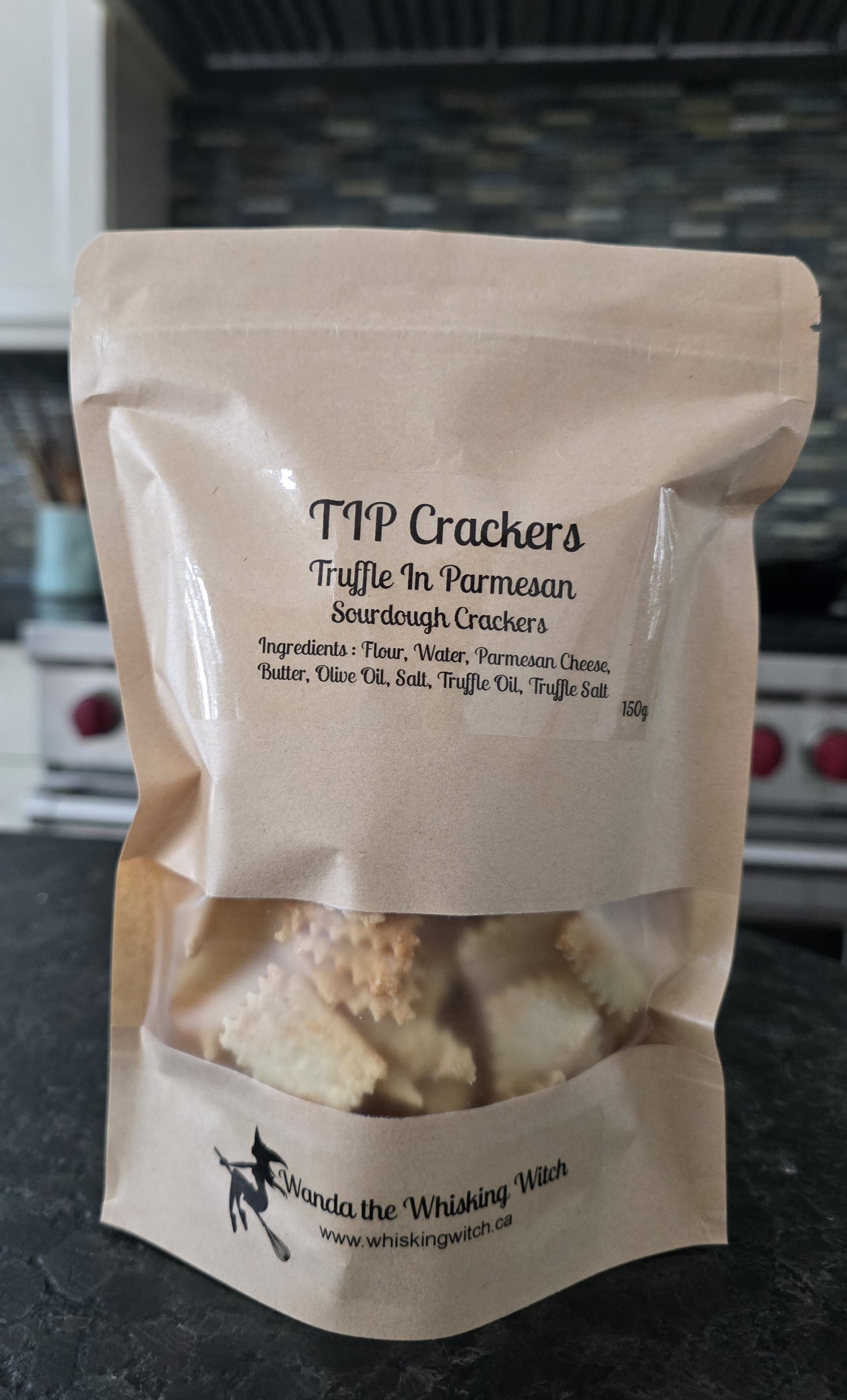 A bag of TIP Truffle Parmesan sourdough crackers